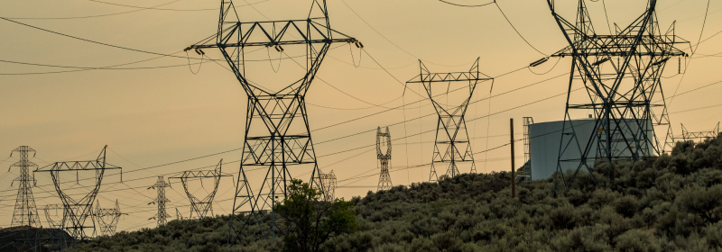 Electric Transmission Tower in the picture with brown backgrounds illustrating power infrastructure