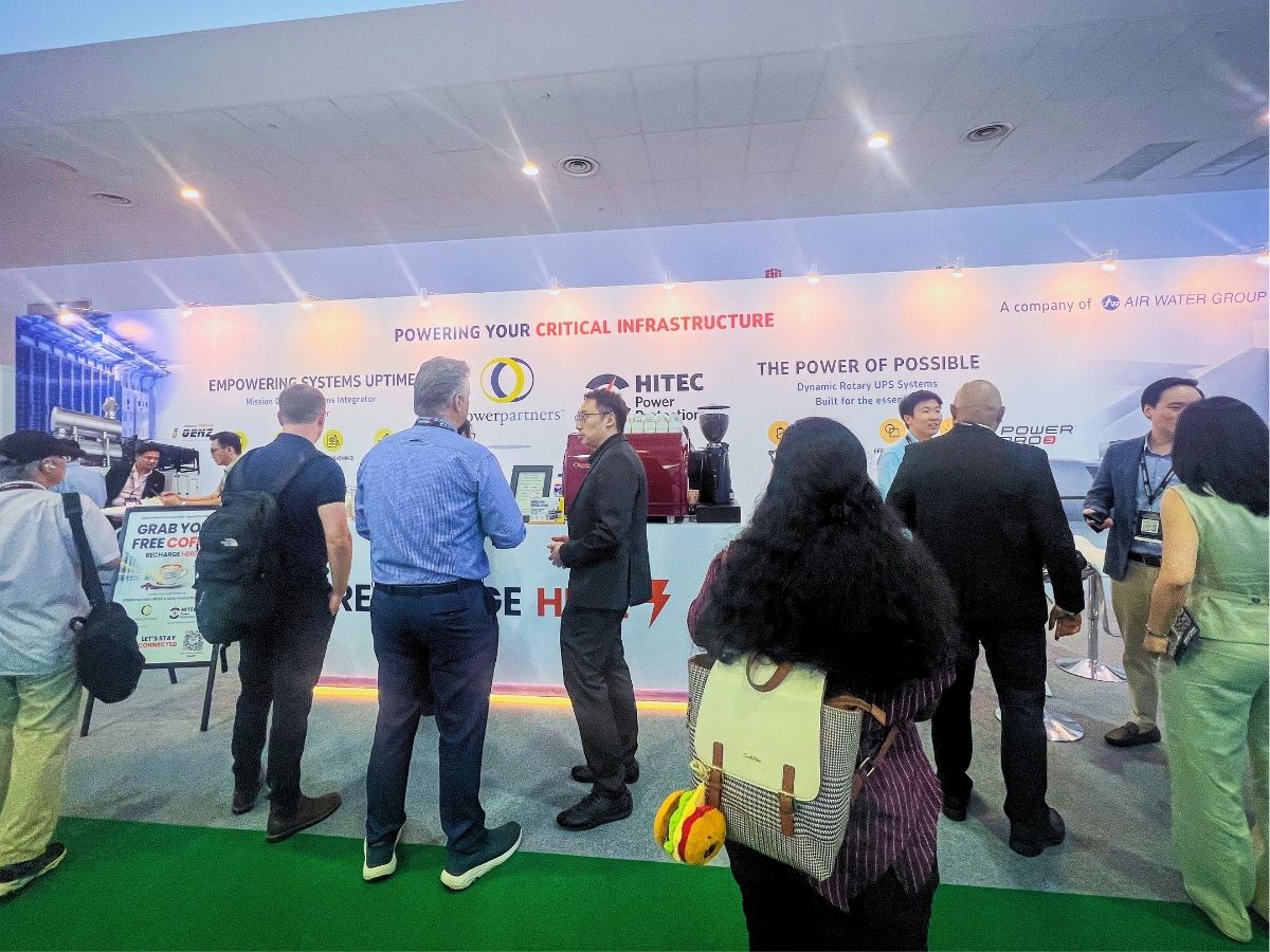 Visitors engaging with Power Partners Group and HITEC at Booth Z15 during Data Centre World Asia 2026